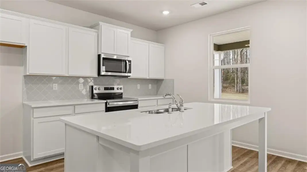 Furnished interior view inside a new home in Twin Lakes, Hoschton (Image 4).