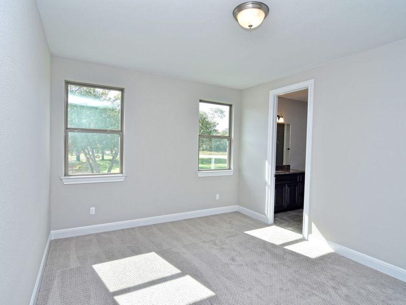 Representative unfurnished interior of a home built from the Avalon by Giddens Homes in Scofield Farms Estates, Georgetown (Image 167).