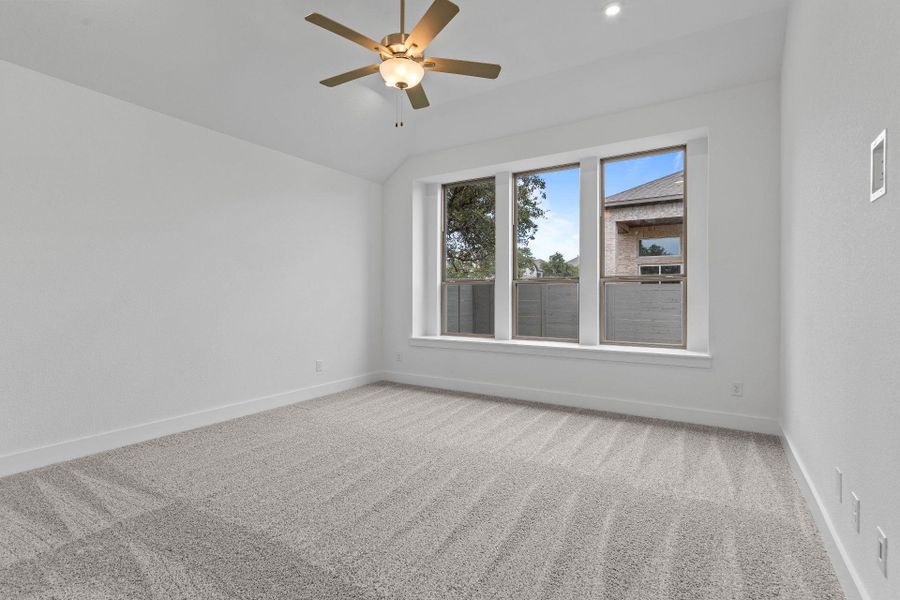 Primary Bedroom with elevated ceiling Primary Bedroom with elevated ceiling