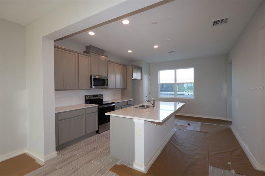 Furnished interior view inside a new home in Tribute at Ovation, Winter Garden (Image 7). Furnished interior view inside a new home in Tribute at Ovation, Winter Garden (Image 7).