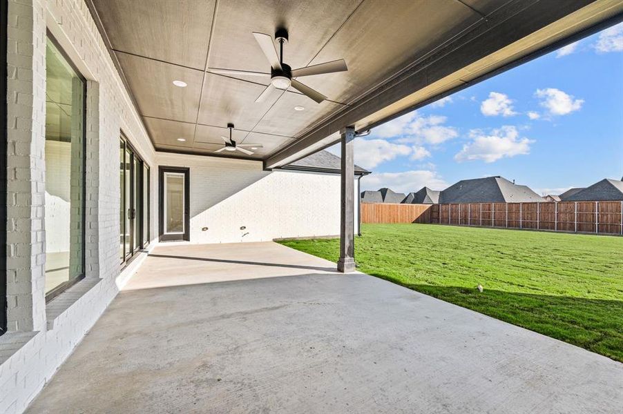 Exterior details and patio area of a home in NorthGlen, Haslet (Image 25).