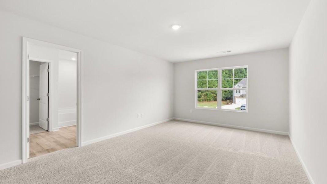Spacious, unfurnished interior of a new home in Waypoint, Flowery Branch (Image 23).