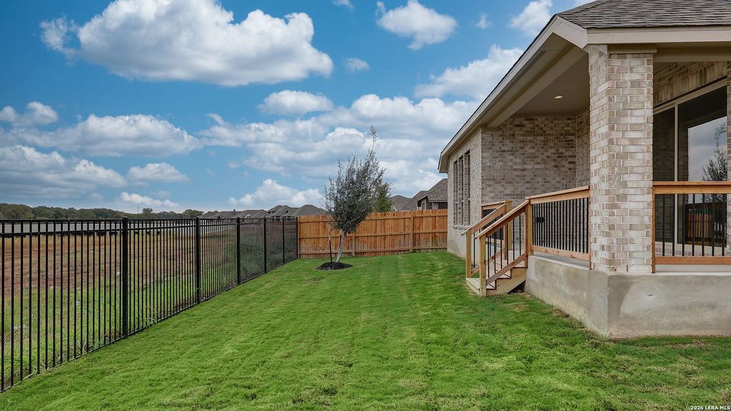 Exterior details and patio area of a home in Alsatian Oaks, Castroville (Image 3).
