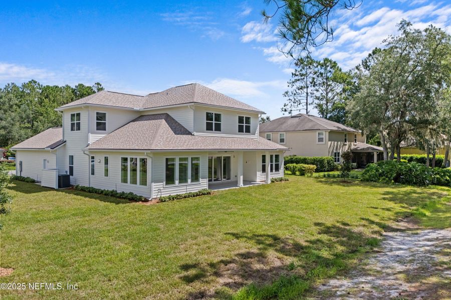 Front exterior of a new home in , Orange Park, FL, highlighting curb appeal (Image 21).