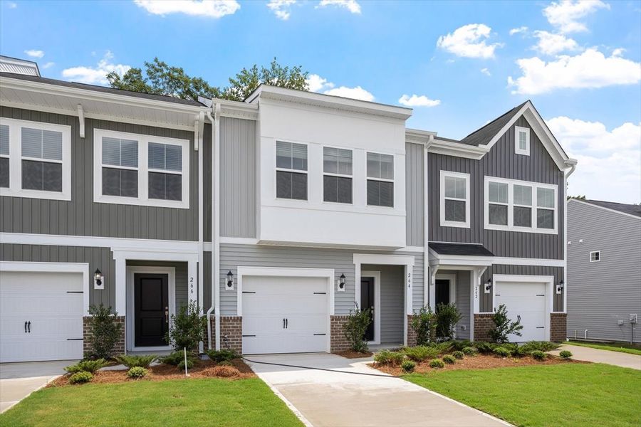 Front exterior of a new home in West Main Townhomes, Sanford, NC, highlighting curb appeal (Image 17).