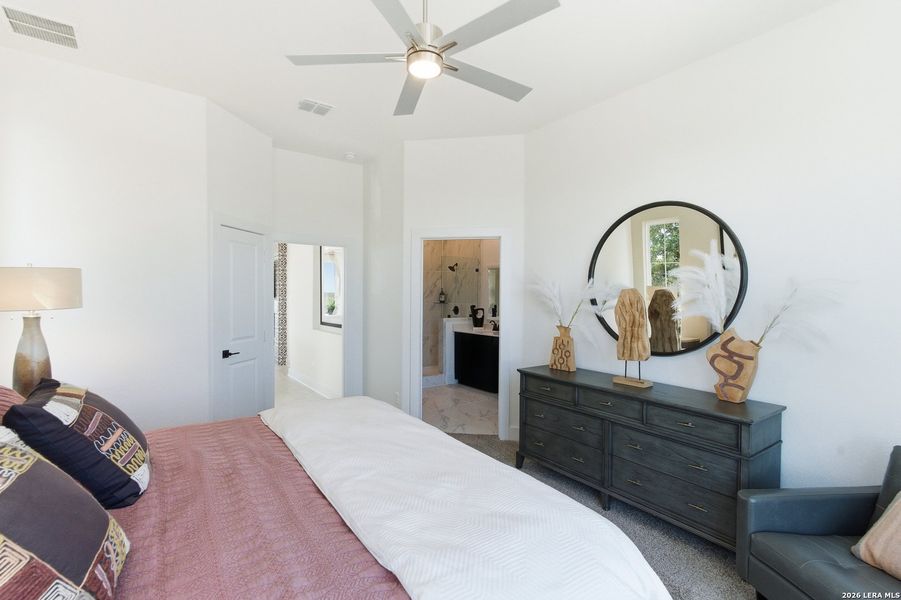 Furnished interior view inside a new home in Centero at Stone Oak, San Antonio (Image 32).