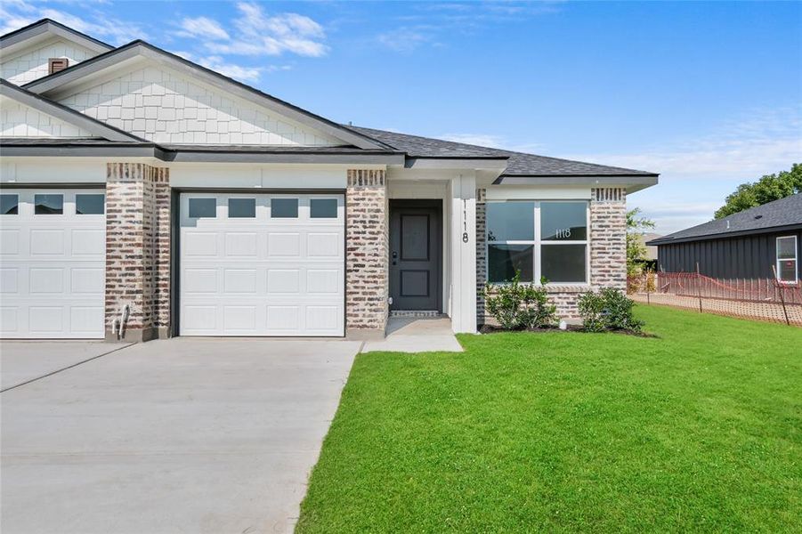 Front exterior of a new home in , Troy, TX, highlighting curb appeal (Image 1). Front exterior of a new home in , Troy, TX, highlighting curb appeal (Image 1).