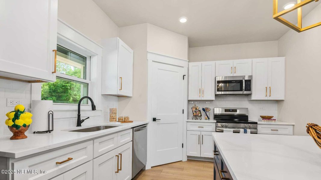 Furnished interior view inside a new home in , Hampton (Image 8).