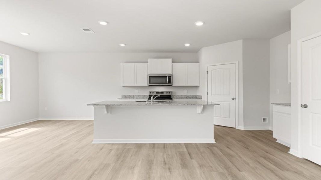 Furnished interior view inside a new home in Oaks at Cedar Grove, Fairburn (Image 4).