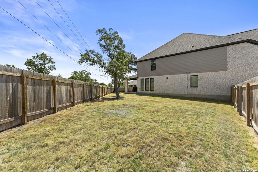 Exterior details and patio area of a home in Kallison Ranch, San Antonio (Image 21).