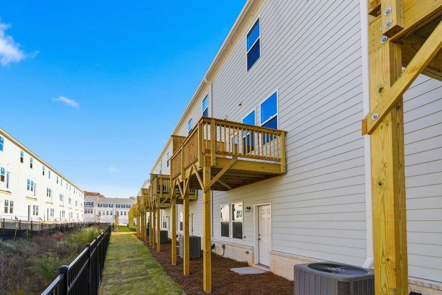 Exterior details and patio area of a home in Chandler Run, Tucker (Image 23).