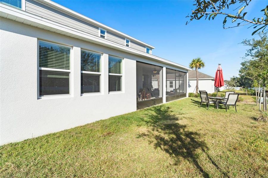 Exterior details and patio area of a home in Rhett's Ridge: Legacy Collection, Apopka (Image 4).
