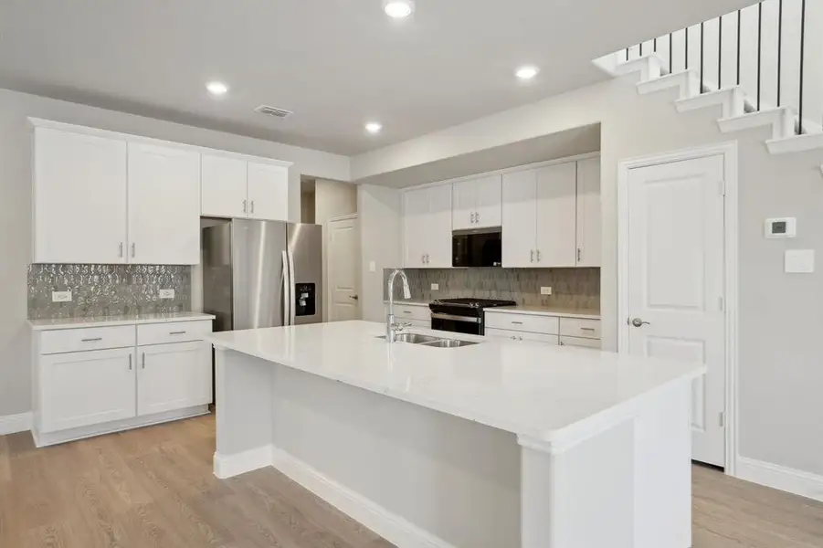 Photo is not of the actual home, but is an inspirational photo of builder’s model home and may depict options, furnishings, and/or decorator features that are not included.