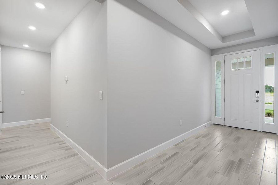 Spacious, unfurnished interior of a new home in Colbert Landings, Palm Coast (Image 27).