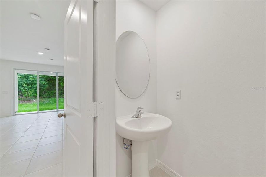Furnished interior view inside a new home in Towns at Greenleaf, Oviedo (Image 9).
