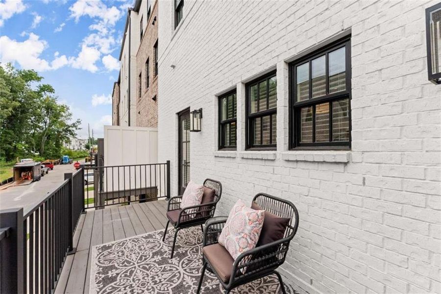 Exterior details and patio area of a home in Skyview On Broad, Sugar Hill (Image 26).