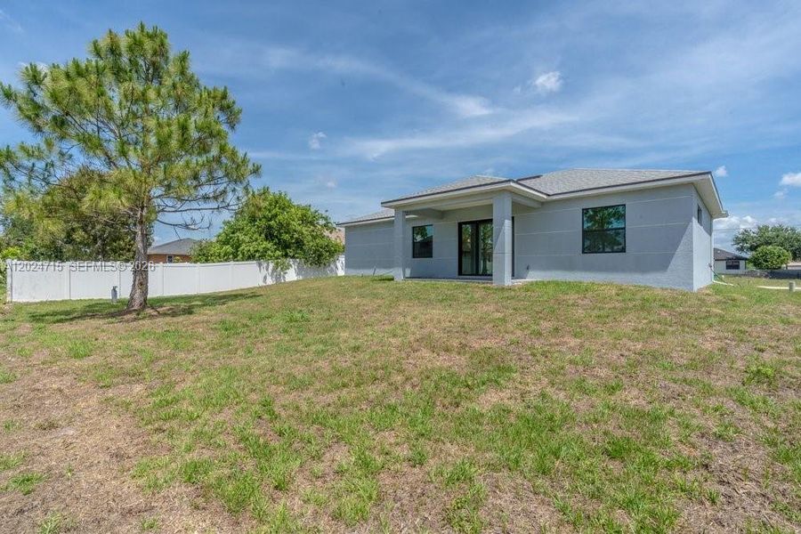 Exterior details and patio area of a home in , Lehigh Acres (Image 15).