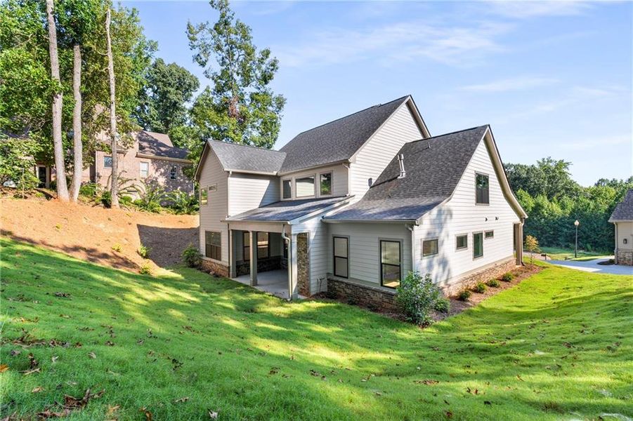 Front exterior of a new home in , Jefferson, GA, highlighting curb appeal (Image 2).