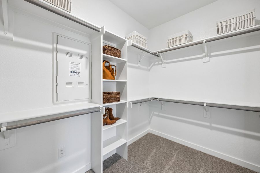 Primary Closet in the Magnolia home plan by Trophy Signature Homes – REPRESENTATIVE PHOTO Primary Closet in the Magnolia home plan by Trophy Signature Homes – REPRESENTATIVE PHOTO