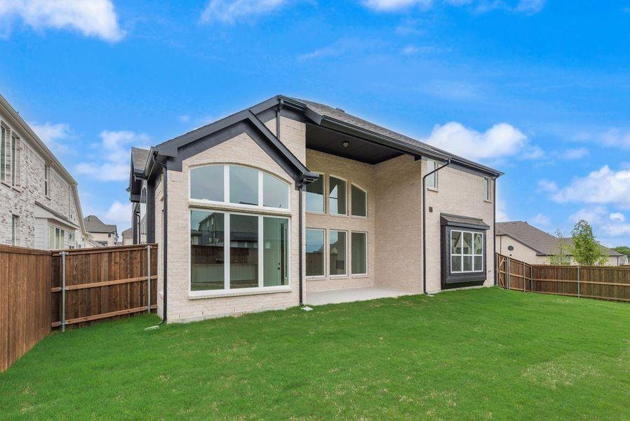 Exterior details and patio area of a home in Monterra, Fate (Image 4).