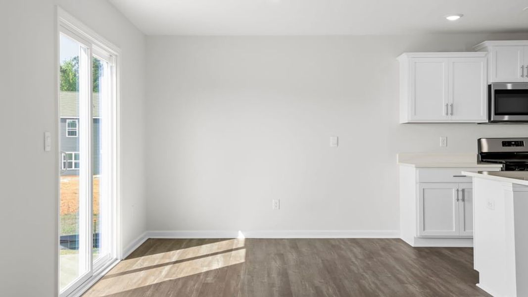 Spacious, unfurnished interior of a new home in Bentley Park, Greenwood (Image 21).