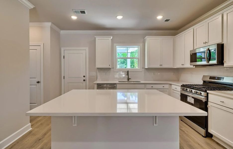 Furnished interior view inside a new home in Satchel Ford, Columbia (Image 7).