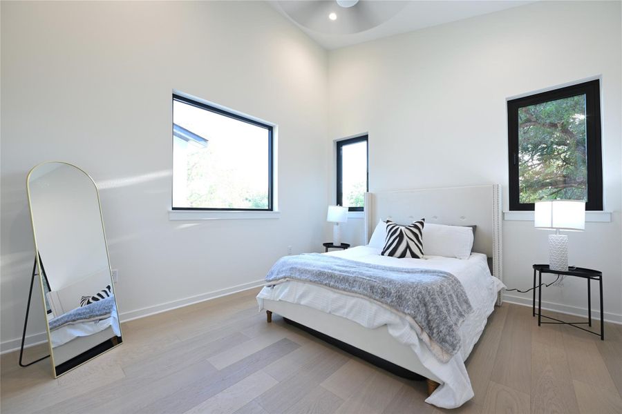 En-suite Master bedroom, cathedral ceilings with recessed lighting, walk-in closet