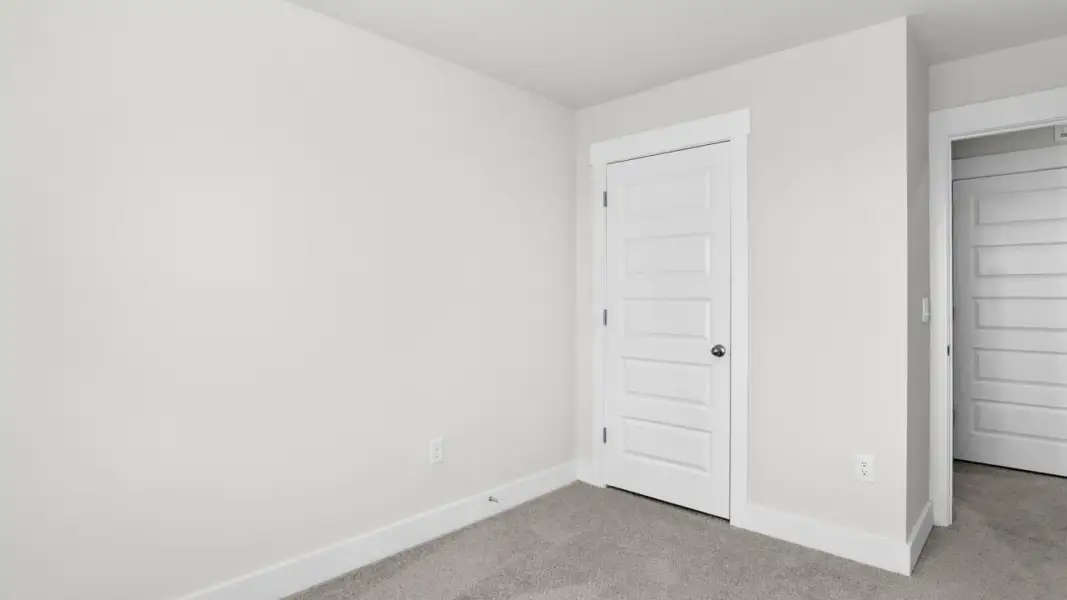 Spacious, unfurnished interior of a new home in The Townes at Cedar Hill Landing, Navassa (Image 26).