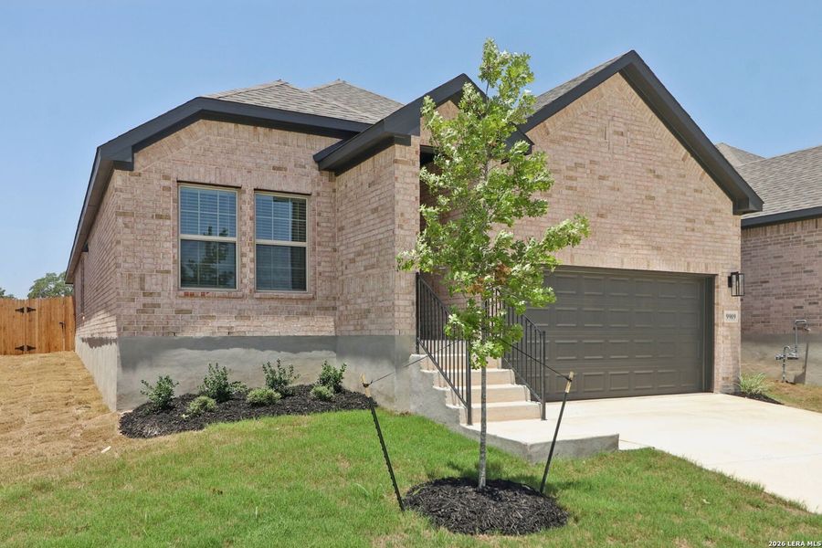 Front exterior of a new home in Kallison Ranch, San Antonio, TX, highlighting curb appeal (Image 22).