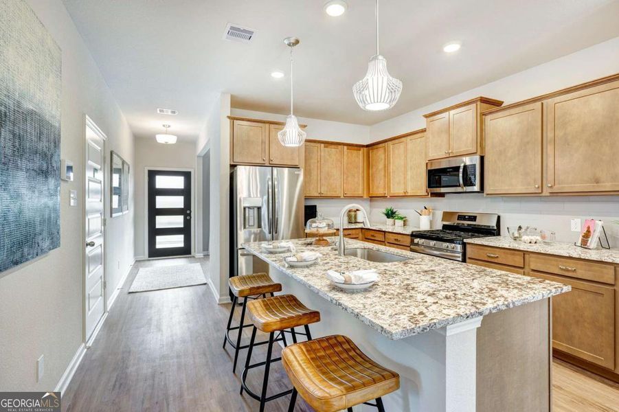 Furnished interior view inside a new home in Cobblestone Crossing Commons, Byron (Image 6).