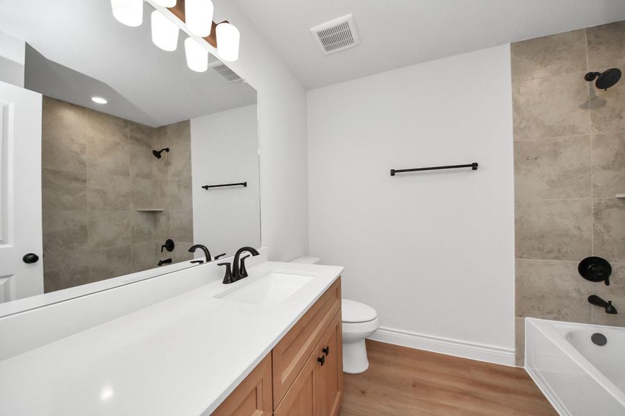 Furnished interior view inside a new home in Lexington Heights, Willis (Image 11).