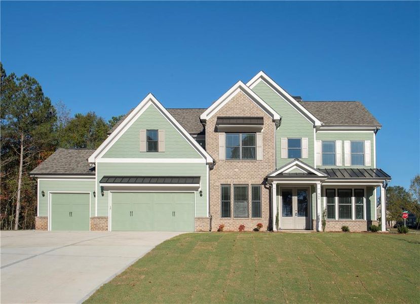 Front exterior of a new home in , Loganville, GA, highlighting curb appeal (Image 1). Front exterior of a new home in , Loganville, GA, highlighting curb appeal (Image 1).