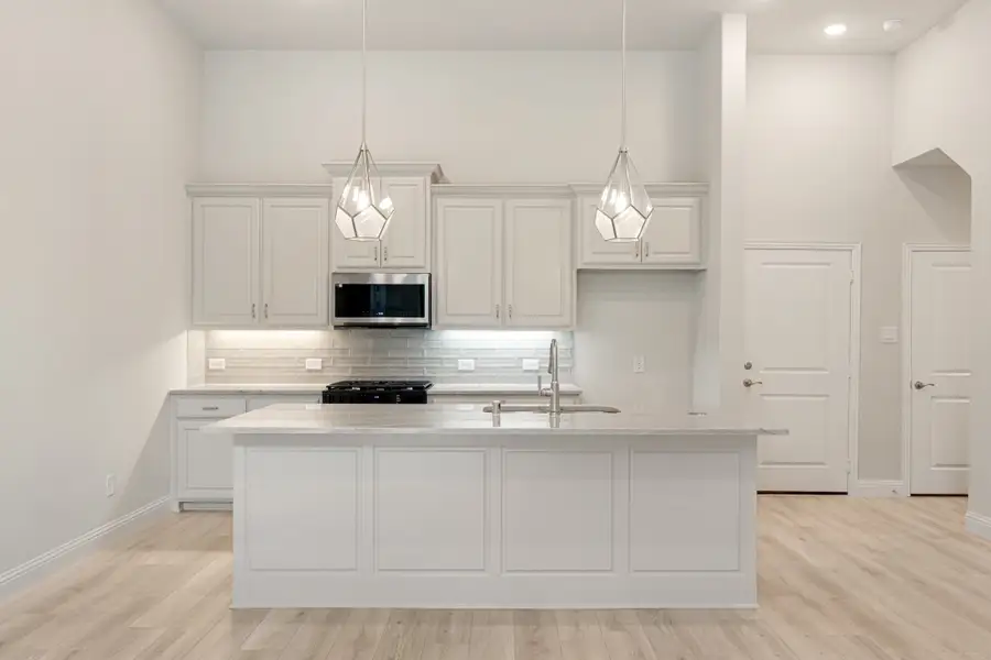 Furnished interior view inside a new home in Cottonwood Creek, Rowlett (Image 9).