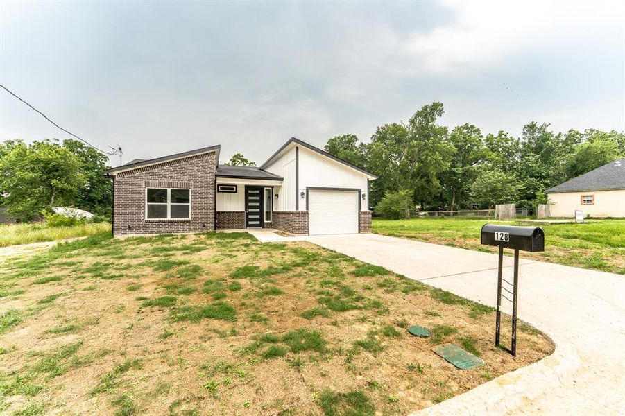 Front exterior of a new home in , Sulphur Springs, TX, highlighting curb appeal (Image 17). Front exterior of a new home in , Sulphur Springs, TX, highlighting curb appeal (Image 17).