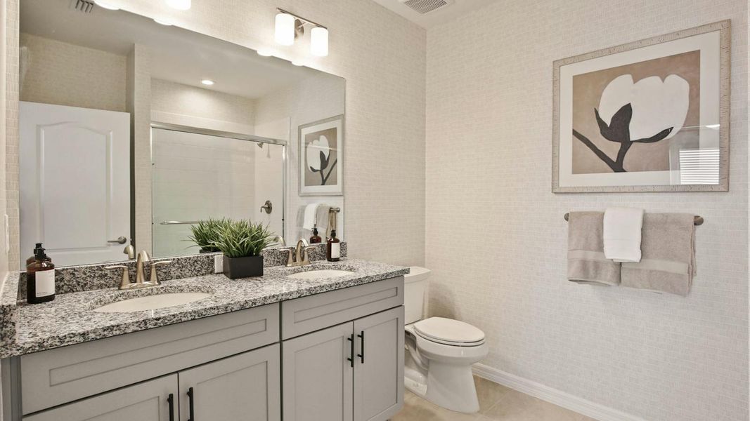 Furnished interior view inside a new home in Palm Grove Real Estate and Homes for Sale in Lakewood Ranch, FL - Neal Communities, Lakewood Ranch (Image 13).