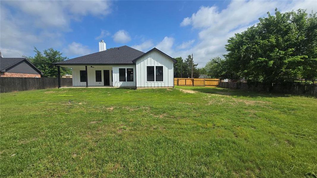 Exterior details and patio area of a home in , Springtown (Image 3).