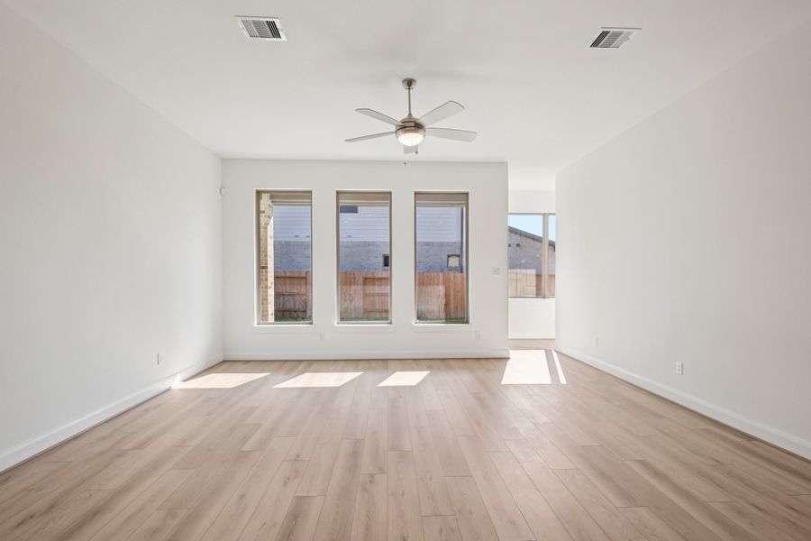 Representative unfurnished interior of a home built from the Kyle by Risewell Homes in Marvida, Cypress (Image 10).