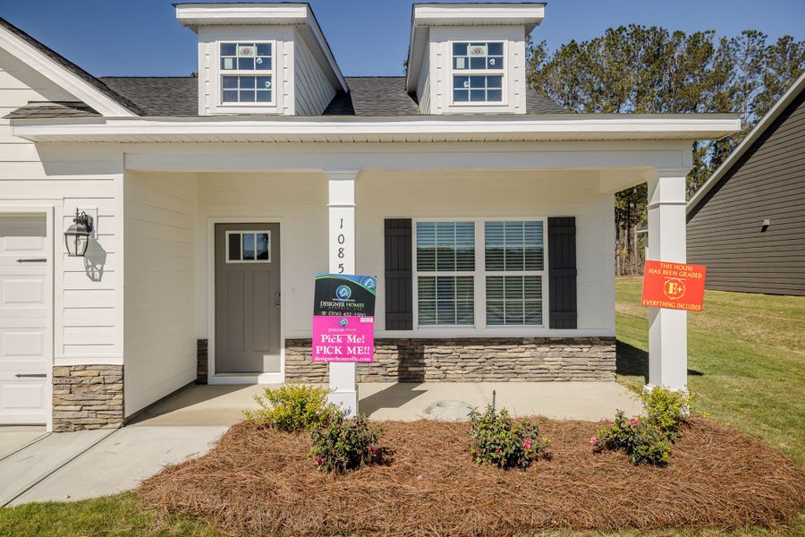 Front exterior of a new home in Millbrook, Thomson, GA, highlighting curb appeal (Image 23). Front exterior of a new home in Millbrook, Thomson, GA, highlighting curb appeal (Image 23).