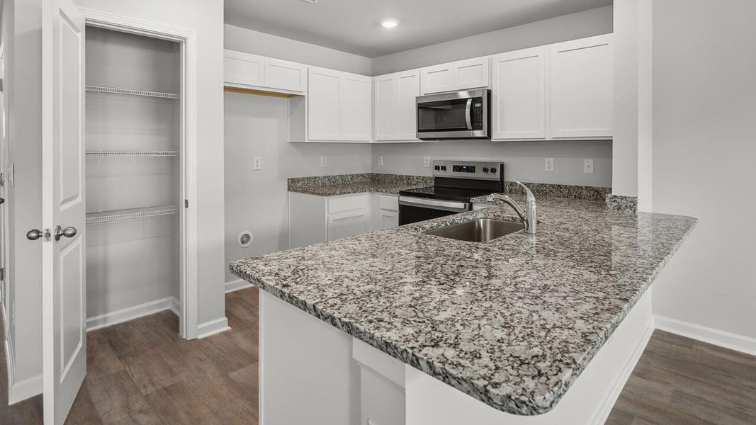 Furnished interior view inside a new home in Townes at Seabrooke, Leland (Image 9).