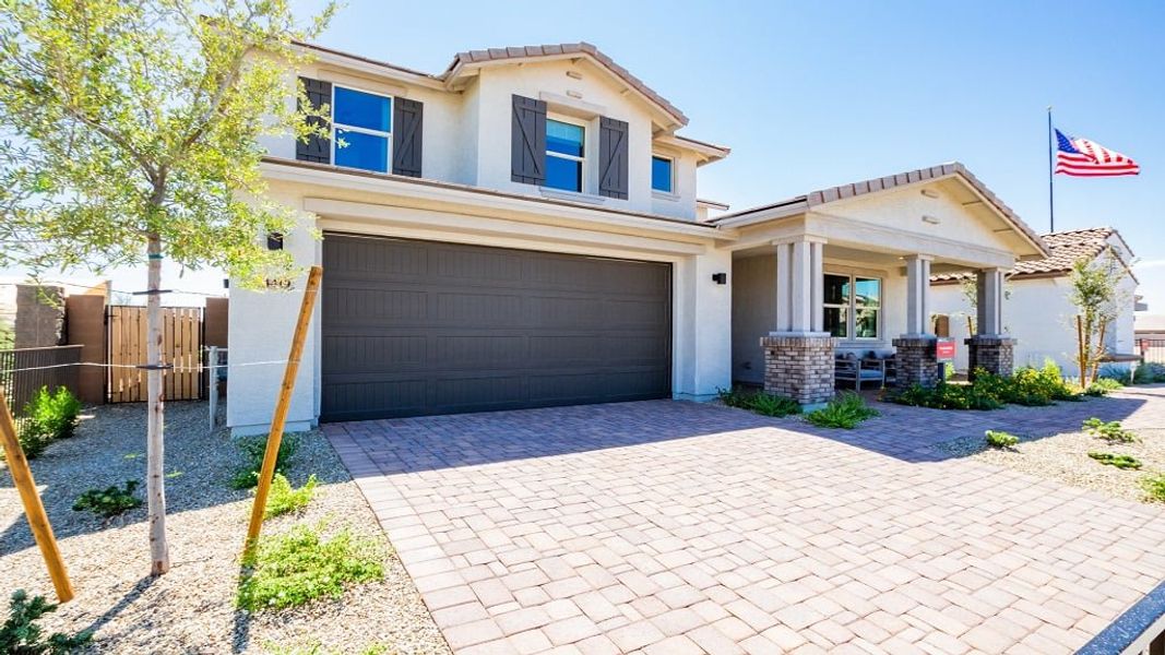 Representative exterior photo of a completed home built from the 40R3 by Taylor Morrison in Los Cielos at Rancho Mercado, Surprise, AZ (Image 21).