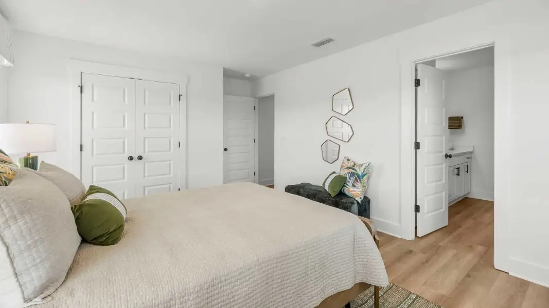 Furnished interior view inside a new home in Crest Bay Cottages, Miramar Beach (Image 26).