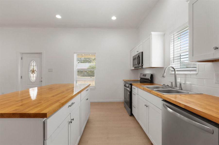 Furnished interior view inside a new home in , Point Blank (Image 8).