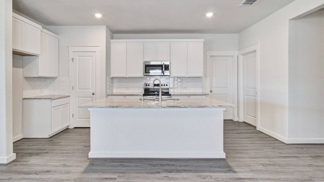 Representative furnished interior of a home built from the Paramount by Brightland Homes in Mostyn Springs, Magnolia (Image 4).