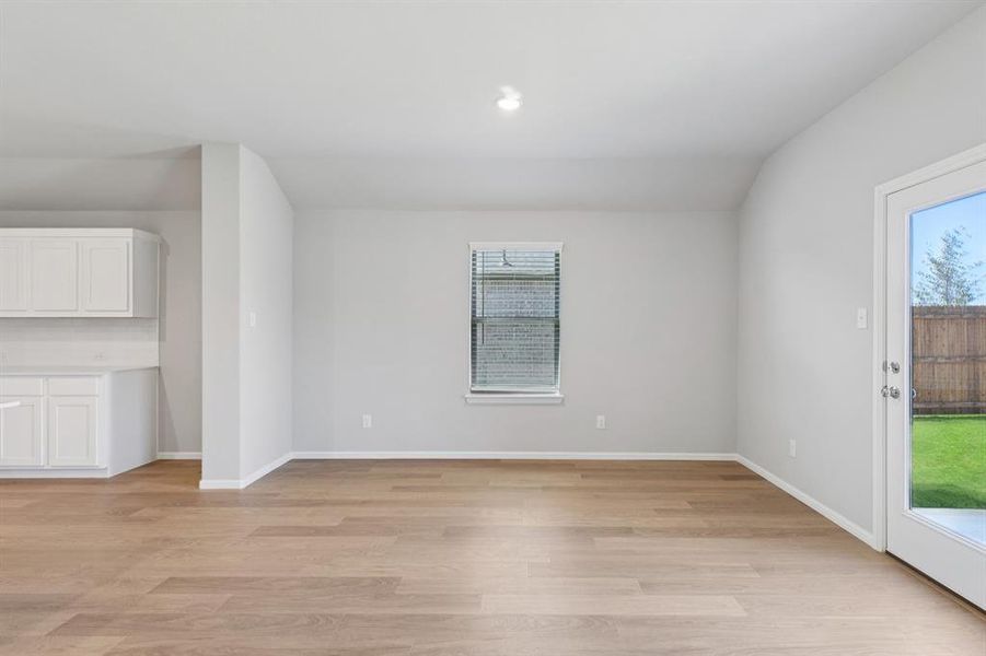 Living Room in the Harrison home plan by Trophy Signature Homes – REPRESENTATIVE PHOTO Living Room in the Harrison home plan by Trophy Signature Homes – REPRESENTATIVE PHOTO