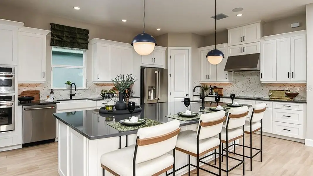 Furnished interior view inside a new home in Esplanade at Westview, Kissimmee (Image 13). Furnished interior view inside a new home in Esplanade at Westview, Kissimmee (Image 13).