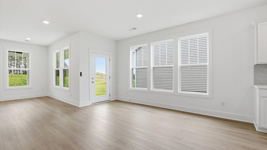Tasteful dining area with current design in this vibrant home near Greenville