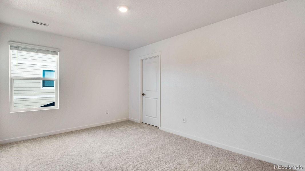 Spacious, unfurnished interior of a new home in Trails at Crowfoot, Parker (Image 34).