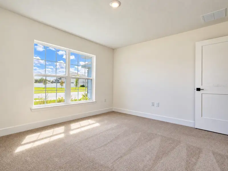 Spacious, unfurnished interior of a new home in Harmony Central, Harmony (Image 10).