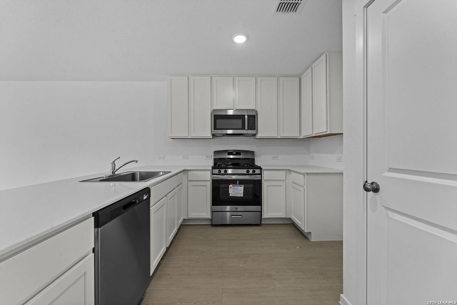 Furnished interior view inside a new home in Torian Village, San Antonio (Image 7).