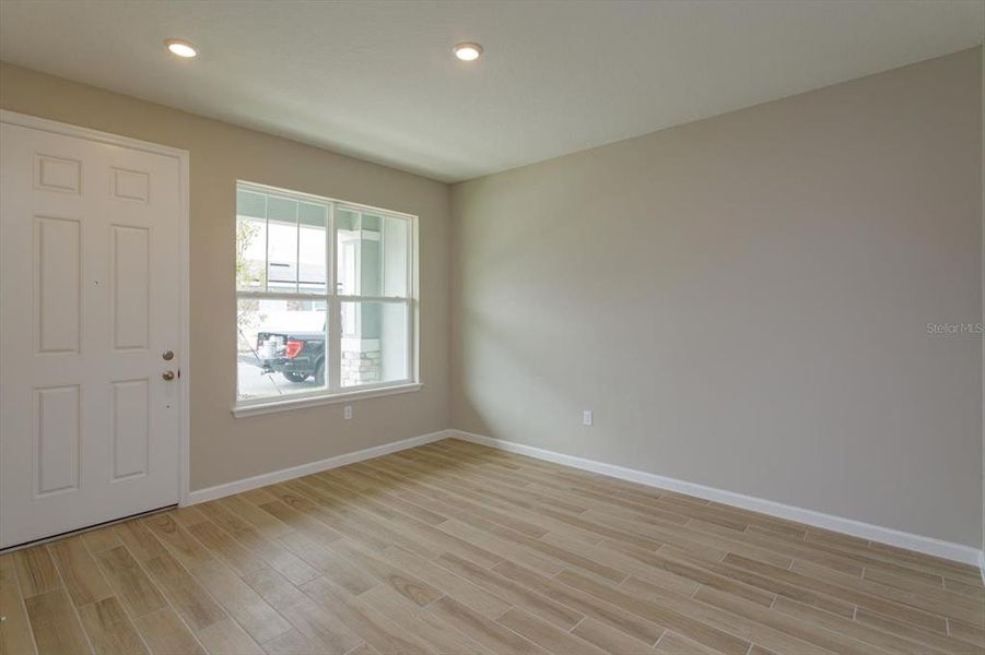 Spacious, unfurnished interior of a new home in Serenade at Ovation, Winter Garden (Image 25).